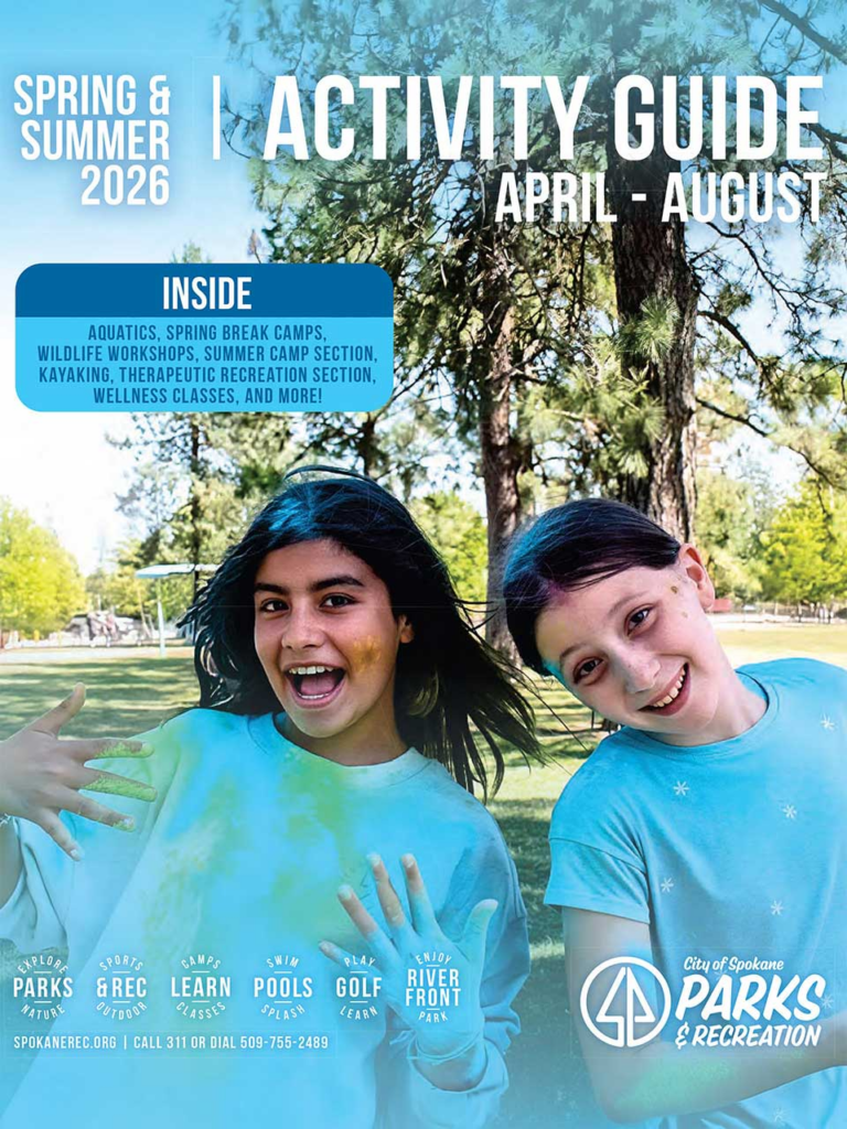Front page of activity guide featuring two young girls with face paint.